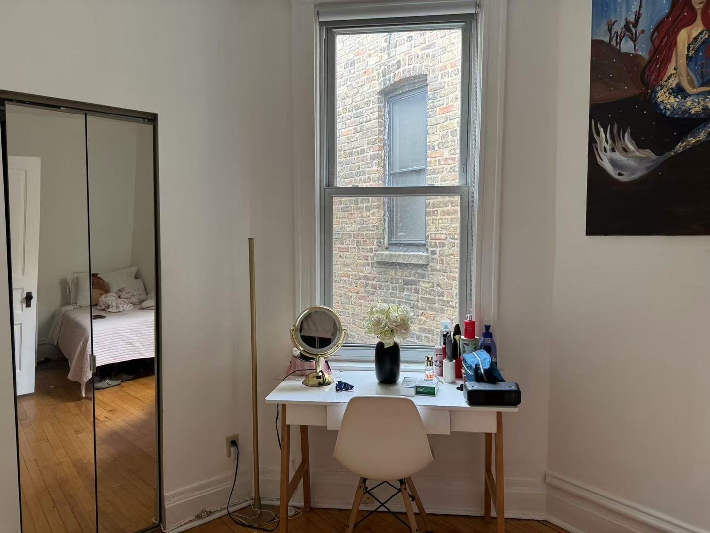 865 West Newport Avenue, Unit 3 Chicago, IL 60657 - Photo 5 of 6 a view of a workspace with furniture and a window