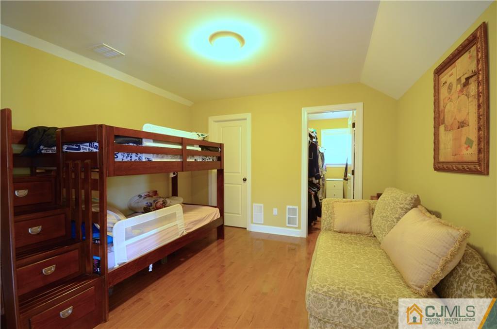 88 Dublin Road Skillman, NJ 08558 - Photo 11 of 22 a bedroom with a bed and a mirror