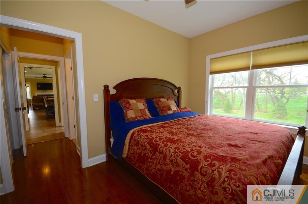 88 Dublin Road Skillman, NJ 08558 - Photo 9 of 22 a bedroom with a bed and a large window