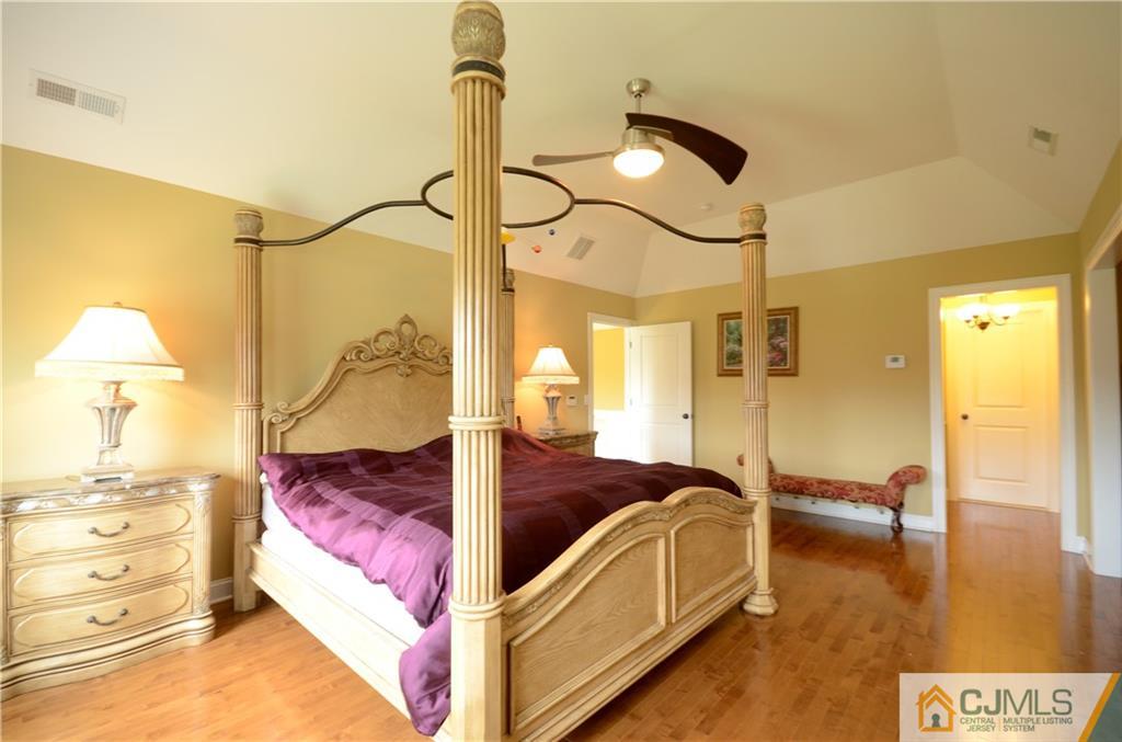 88 Dublin Road Skillman, NJ 08558 - Photo 10 of 22 a spacious bedroom with a bed and ceiling fan