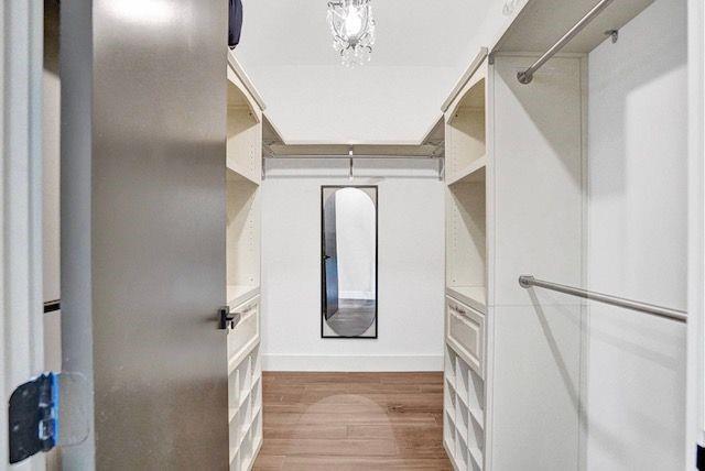 2622 Northeast 27th Avenue Lighthouse Point, FL 33064 - Photo 14 of 24 a view of staircase with railing and white walls