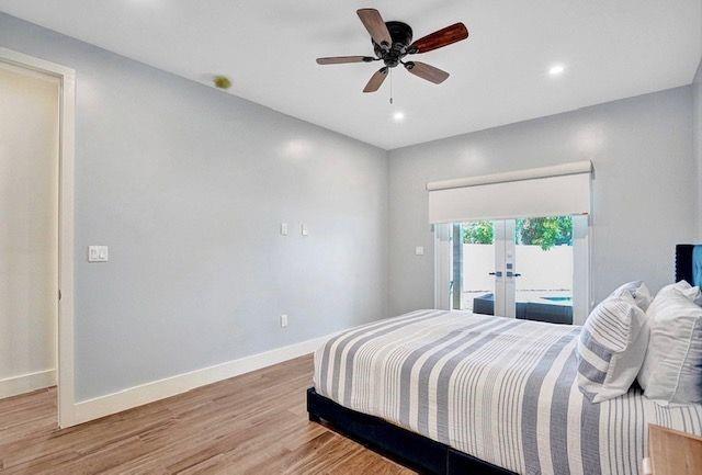 2622 Northeast 27th Avenue Lighthouse Point, FL 33064 - Photo 19 of 24 a bedroom with a large bed and a window