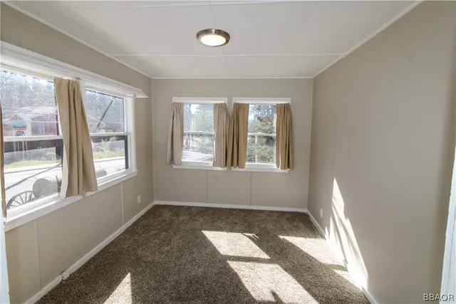 a window in an empty room with a window