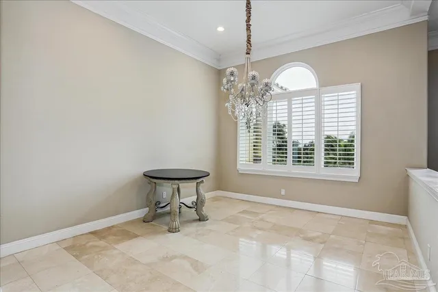a kitchen with a stove sink and cabinets