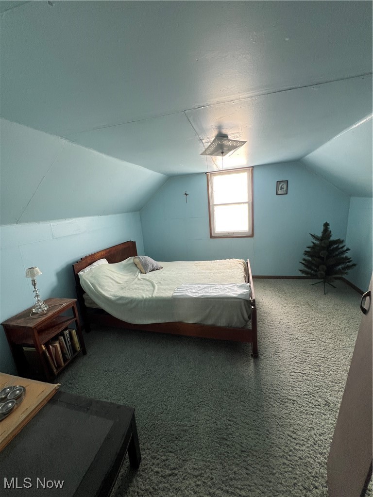 21600 Franklin Road Maple Heights, OH 44137 - Photo 11 of 14 Carpeted bedroom with lofted ceiling