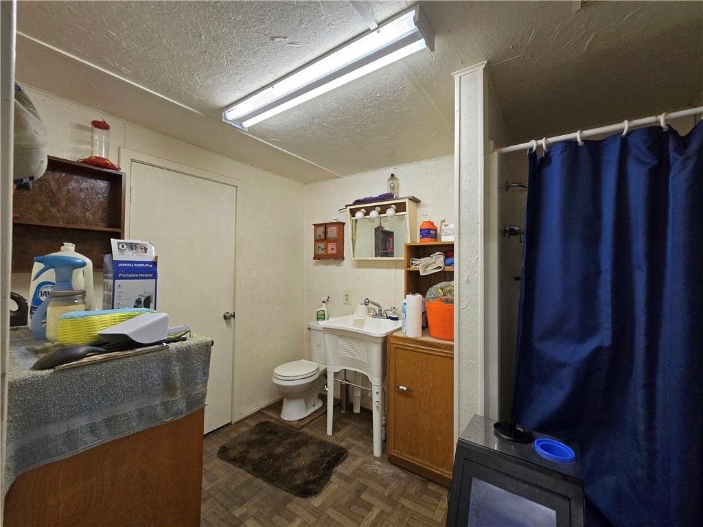 402 Shadow Arbor Circle Somerville, TX 77879 - Photo 20 of 26 a bathroom with a sink toilet vanity and shower