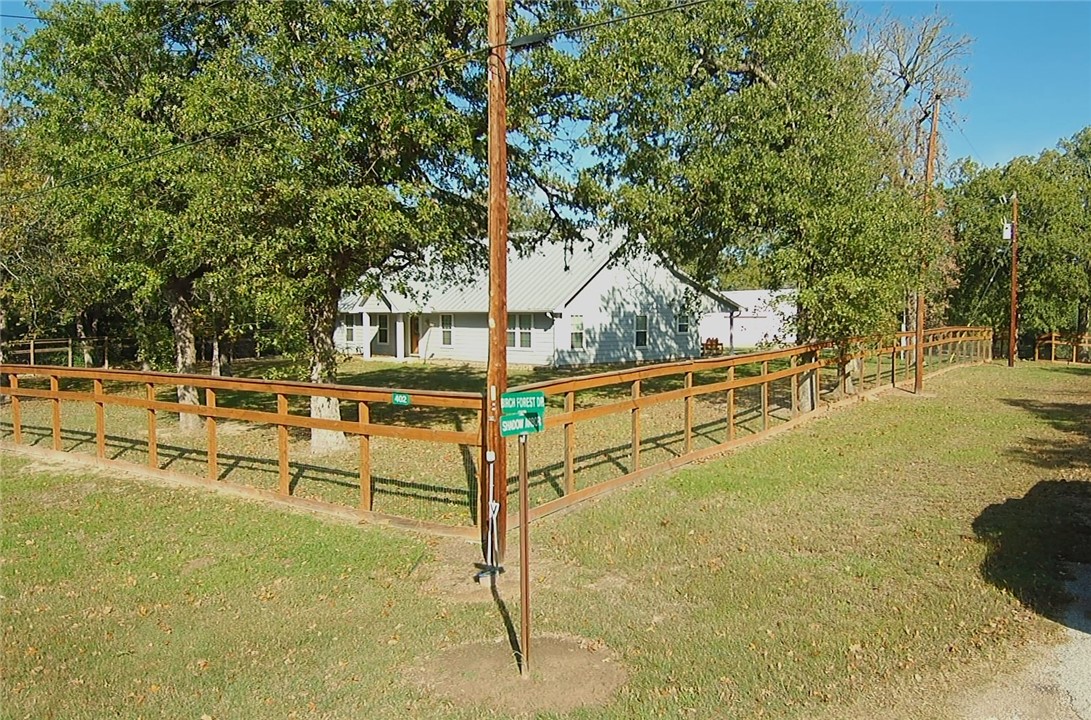 402 Shadow Arbor Circle Somerville, TX 77879 - Photo 2 of 26 a view of a swimming pool with an outdoor space