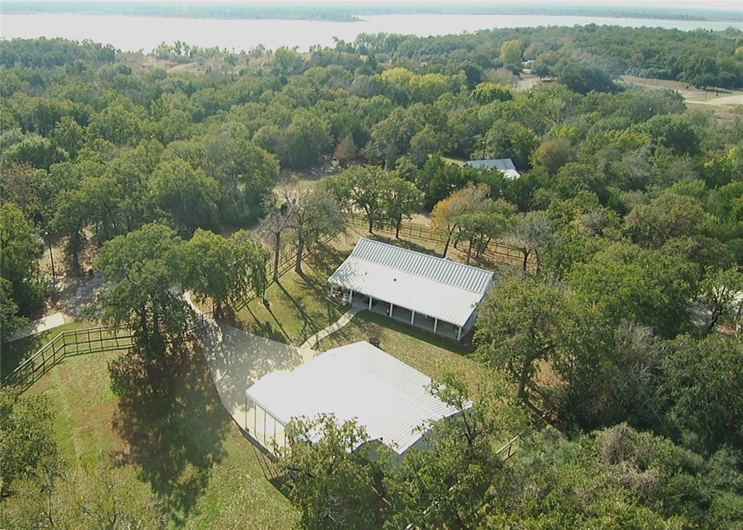 402 Shadow Arbor Circle Somerville, TX 77879 - Photo 25 of 26 an aerial view of a house with yard