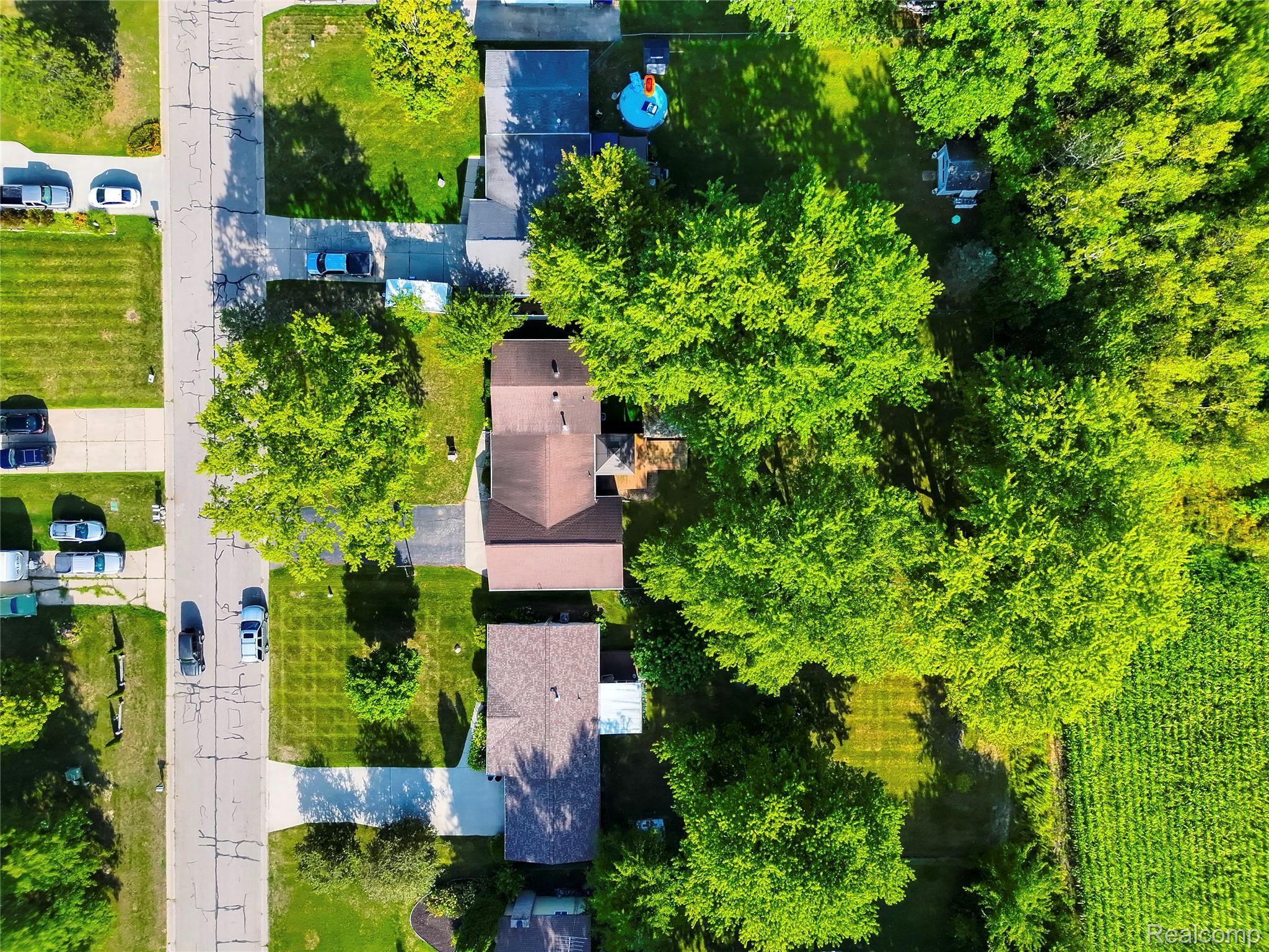 4395 Regency Road Swartz Creek, MI 48473 - Photo 56 of 67 Tree-lined street with multiple residential properties