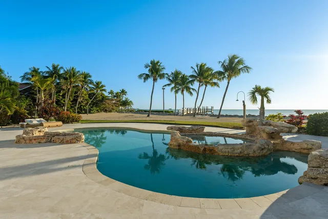a view of an outdoor space and tennis court