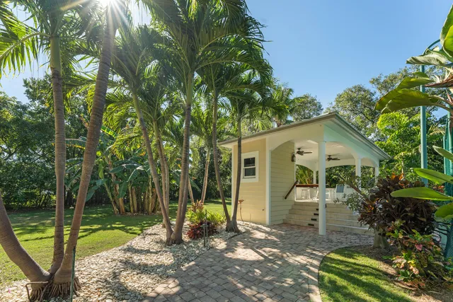 a view of a chairs and a table in a kitchen