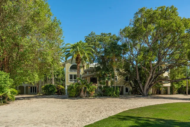 a view of a swimming pool with a lounge chair