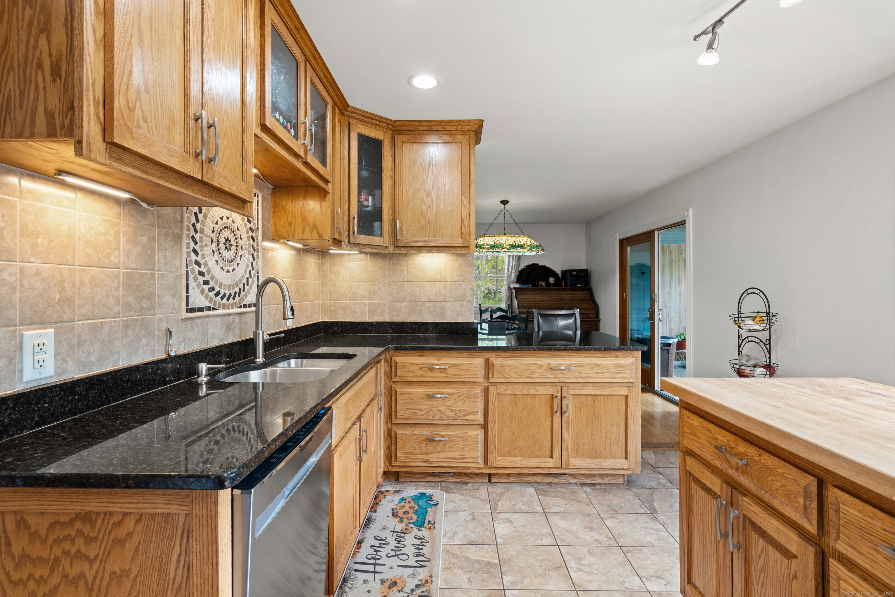 2 Pine Hill Road New Fairfield, CT 06812 - Photo 11 of 40 a kitchen with stainless steel appliances granite countertop a sink stove and cabinets