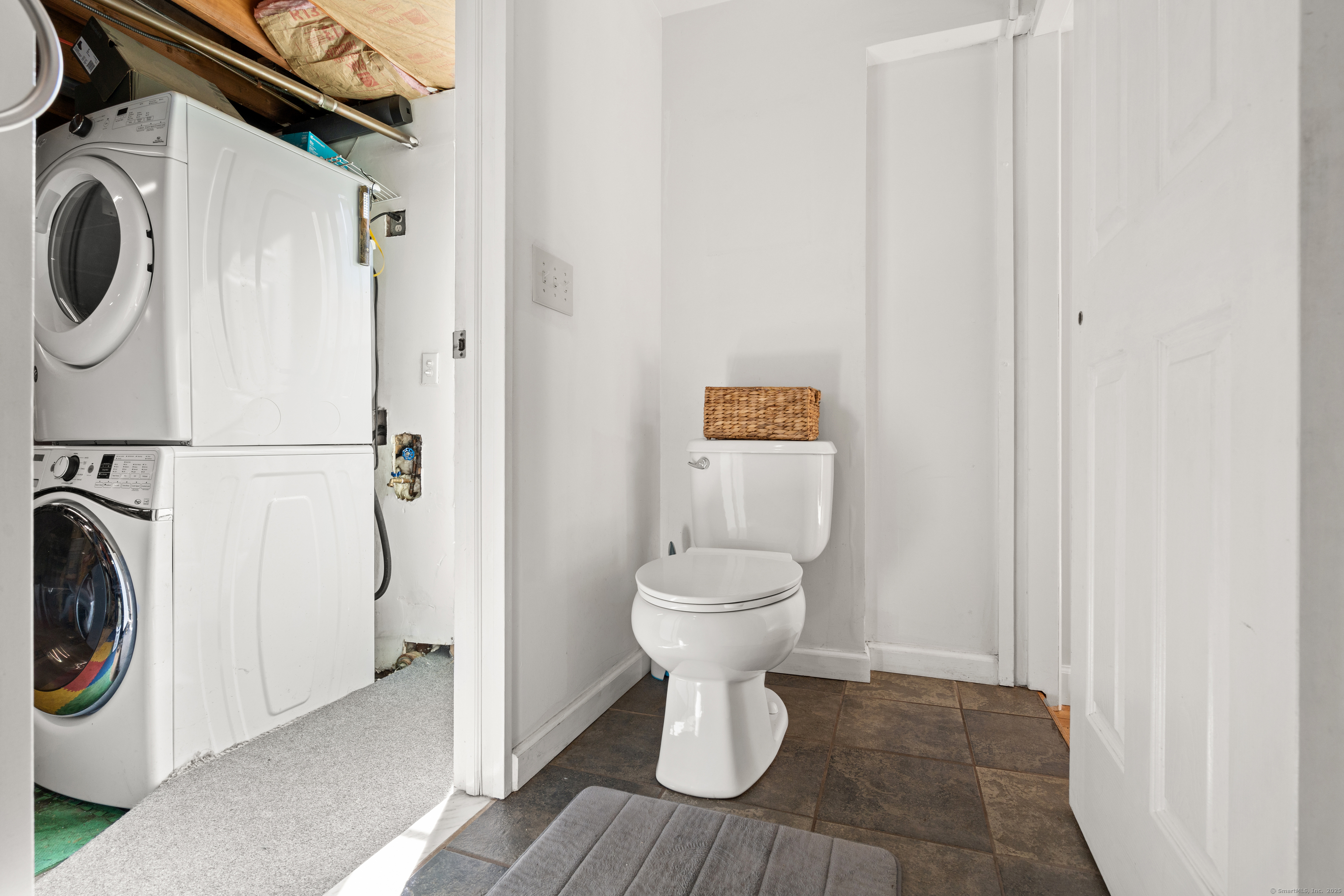 2 Pine Hill Road New Fairfield, CT 06812 - Photo 22 of 40 a view of a bathroom with a washer and dryer