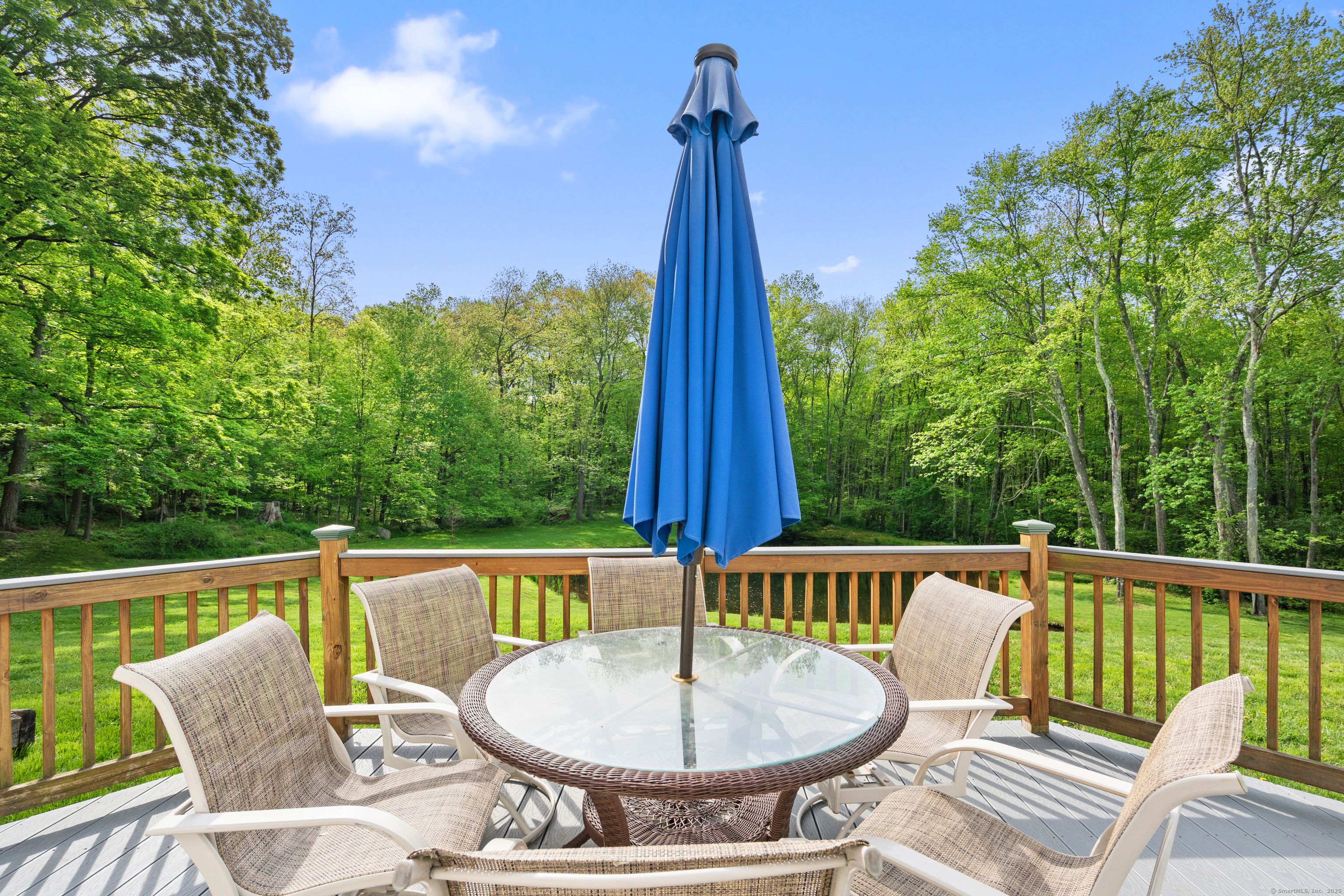 2 Pine Hill Road New Fairfield, CT 06812 - Photo 30 of 40 a balcony with a table and chairs