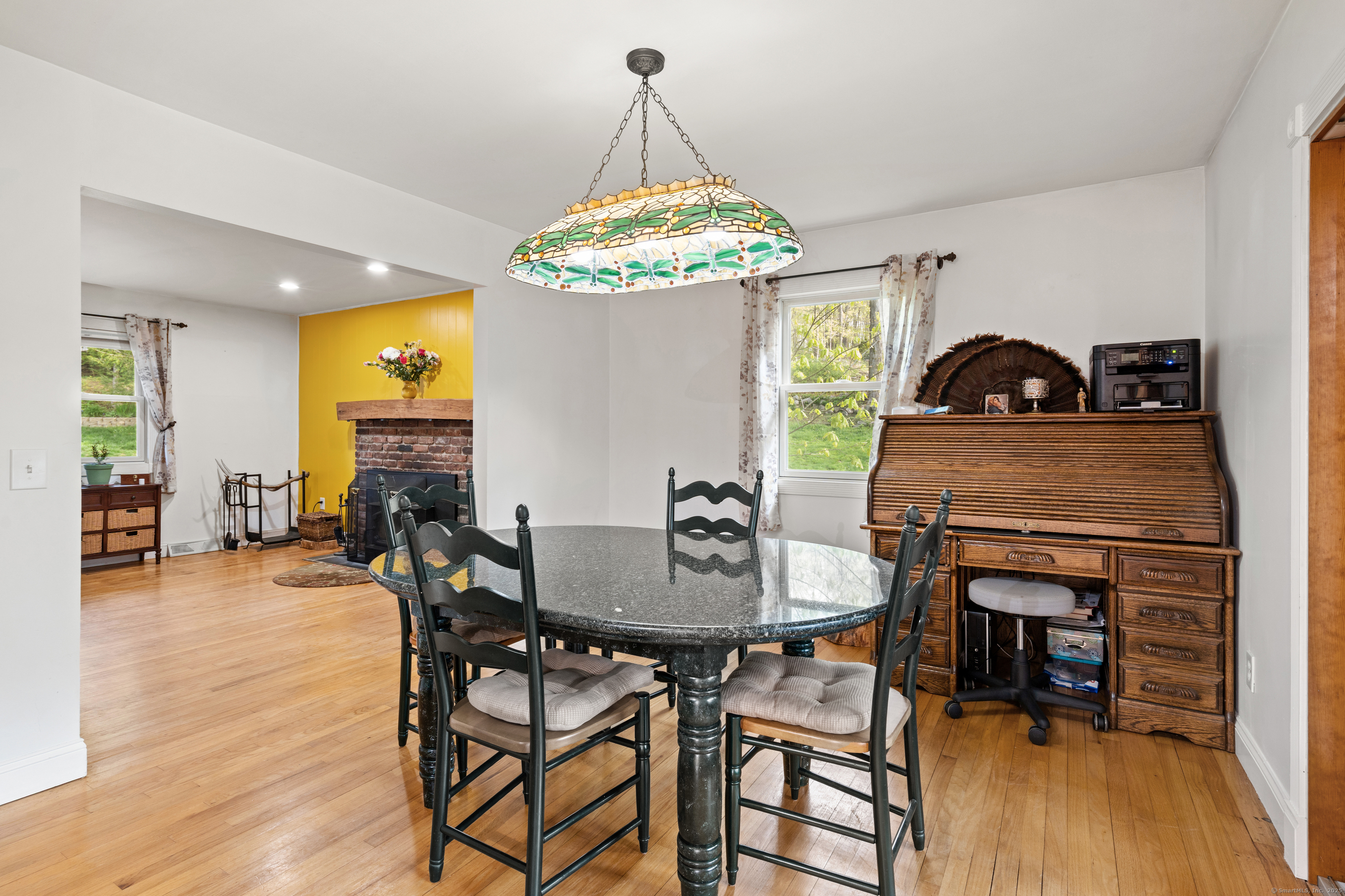 2 Pine Hill Road New Fairfield, CT 06812 - Photo 6 of 40 a view of a dining room with furniture and wooden floor