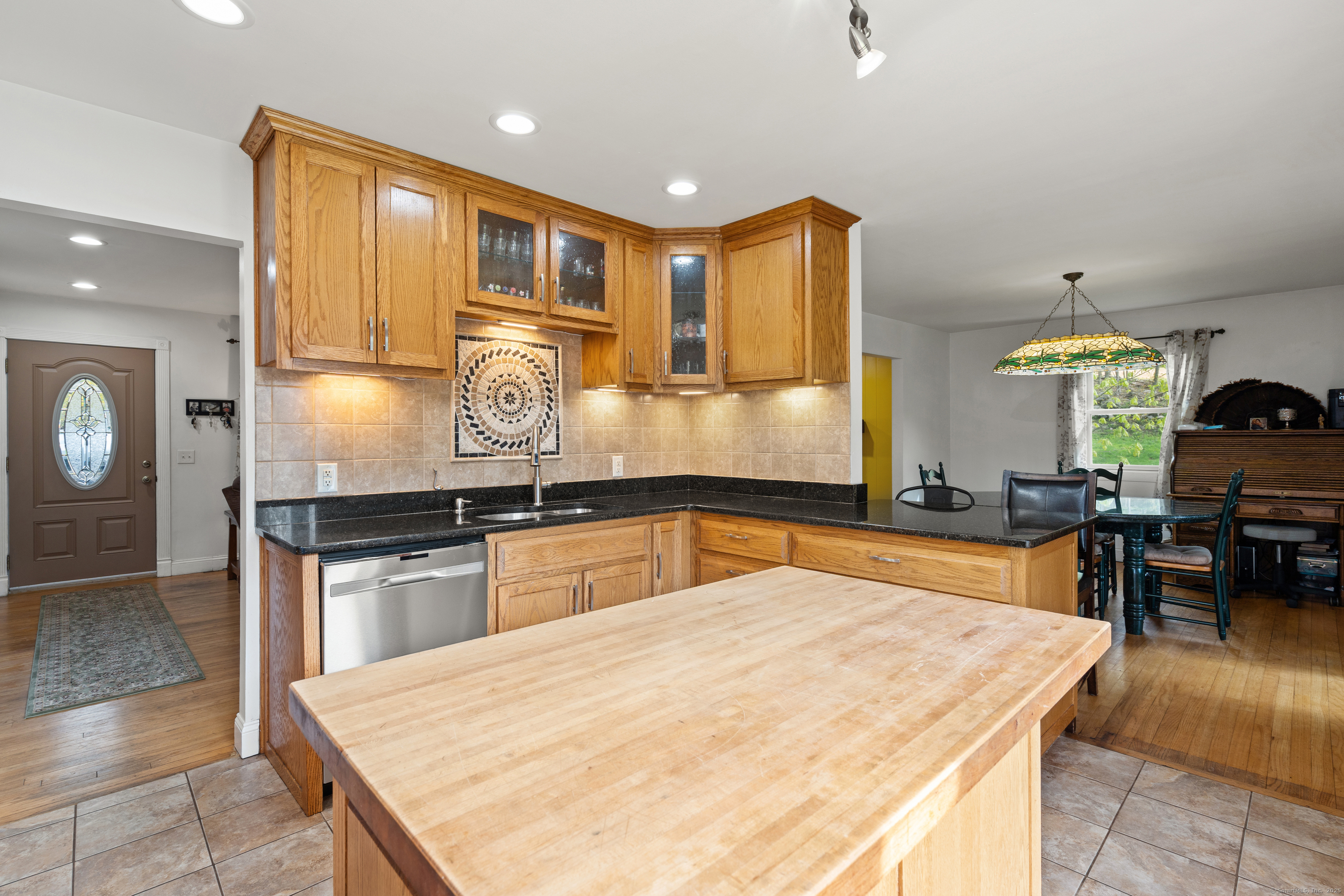 2 Pine Hill Road New Fairfield, CT 06812 - Photo 10 of 40 a kitchen with stainless steel appliances granite countertop a sink and cabinets
