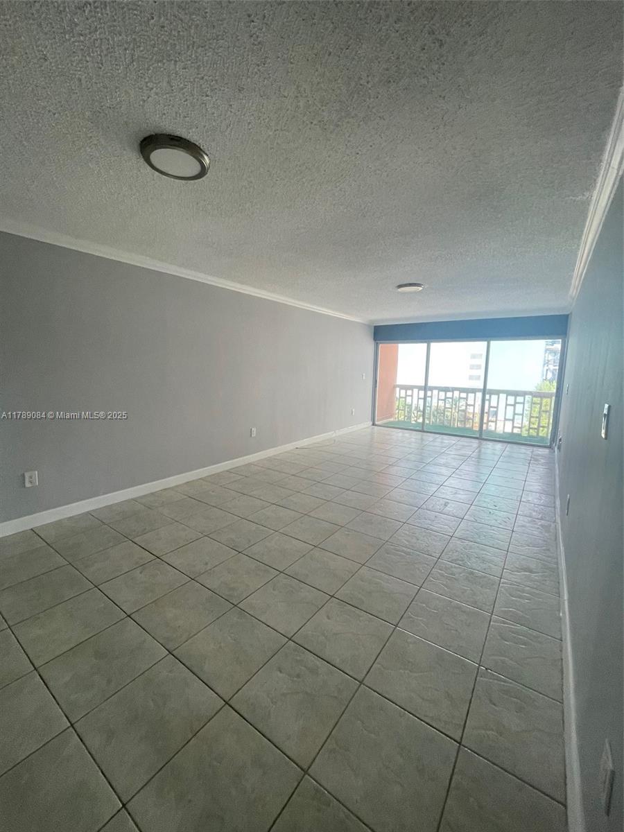 600 Northeast 25th Street, Unit 60 Miami, FL 33137 - Photo 10 of 10 a view of an empty room and window
