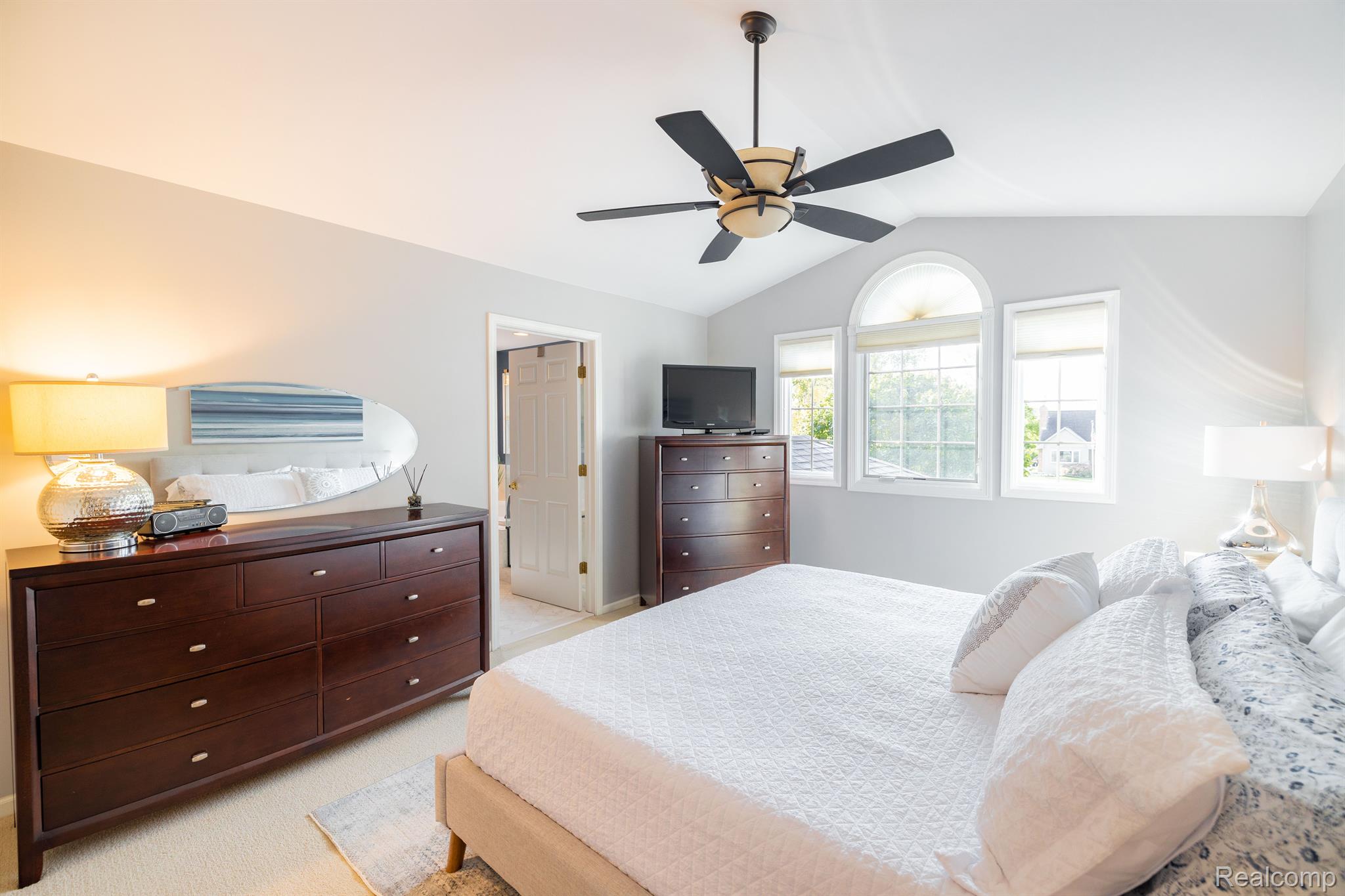 8464 Lake Road Grosse Ile, MI 48138 - Photo 23 of 44 Well appointed primary bedroom with private bath