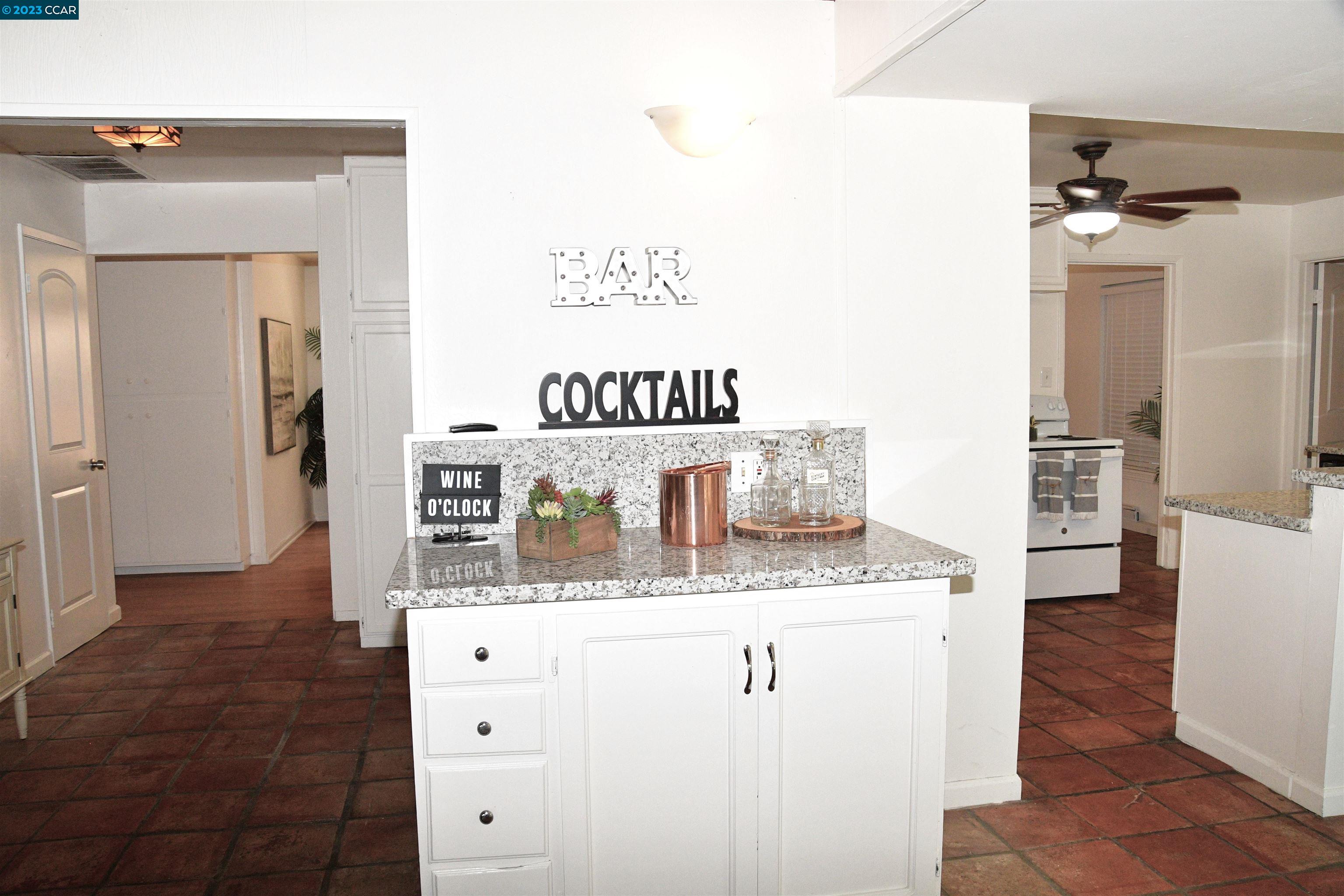 3500 Estudillo Street Martinez, CA 94553 - Photo 5 of 31 a bathroom with a granite countertop sink a mirror and a shower