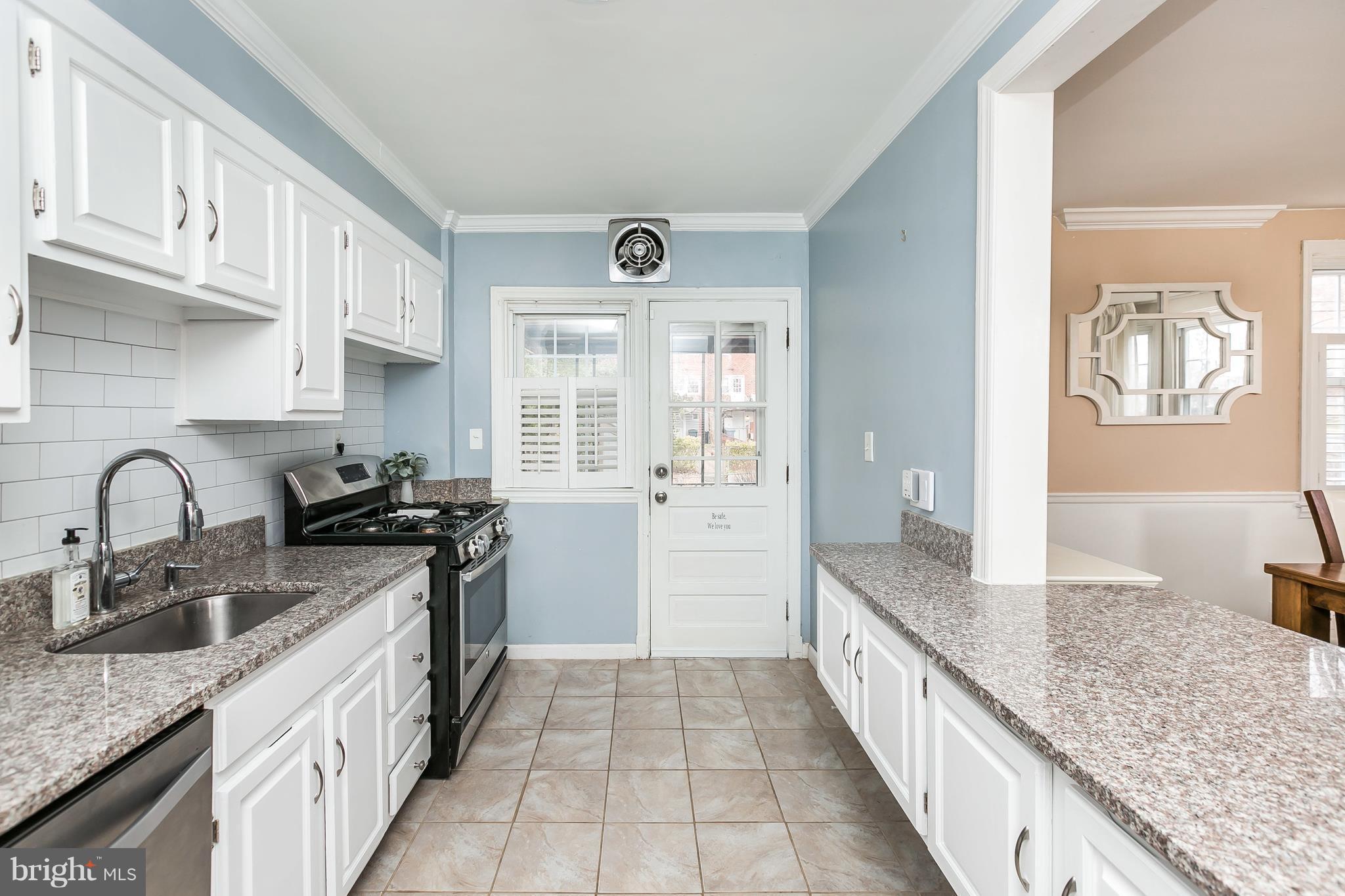 362 Greenlow Road Baltimore, MD 21228 - Photo 10 of 30 a kitchen with stainless steel appliances granite countertop a sink stove and cabinets