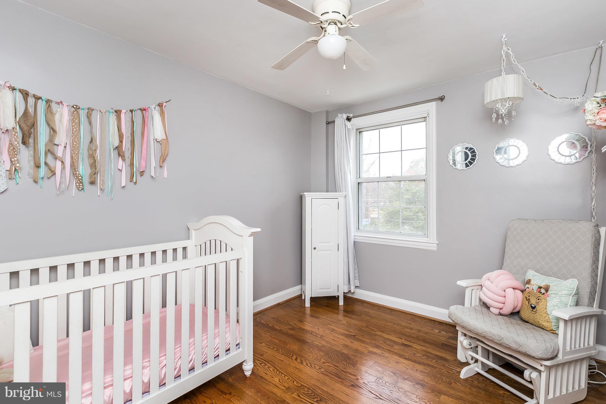 362 Greenlow Road Baltimore, MD 21228 - Photo 15 of 30 a bedroom with furniture and wooden floor