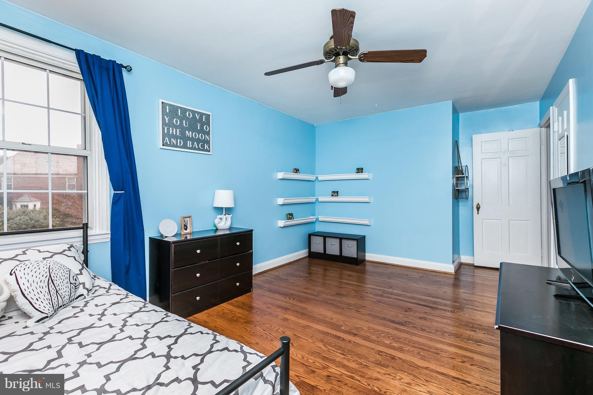 362 Greenlow Road Baltimore, MD 21228 - Photo 17 of 30 a bedroom with a bed dresser and a flat tv screen