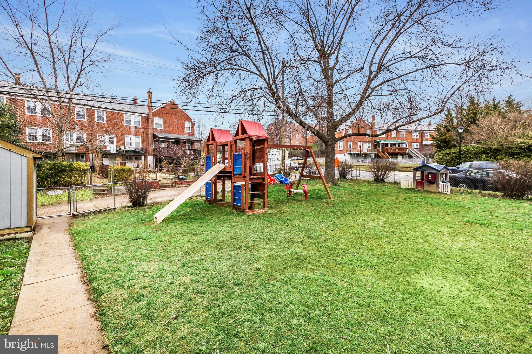 362 Greenlow Road Baltimore, MD 21228 - Photo 25 of 30 a view of a park with swings and slides
