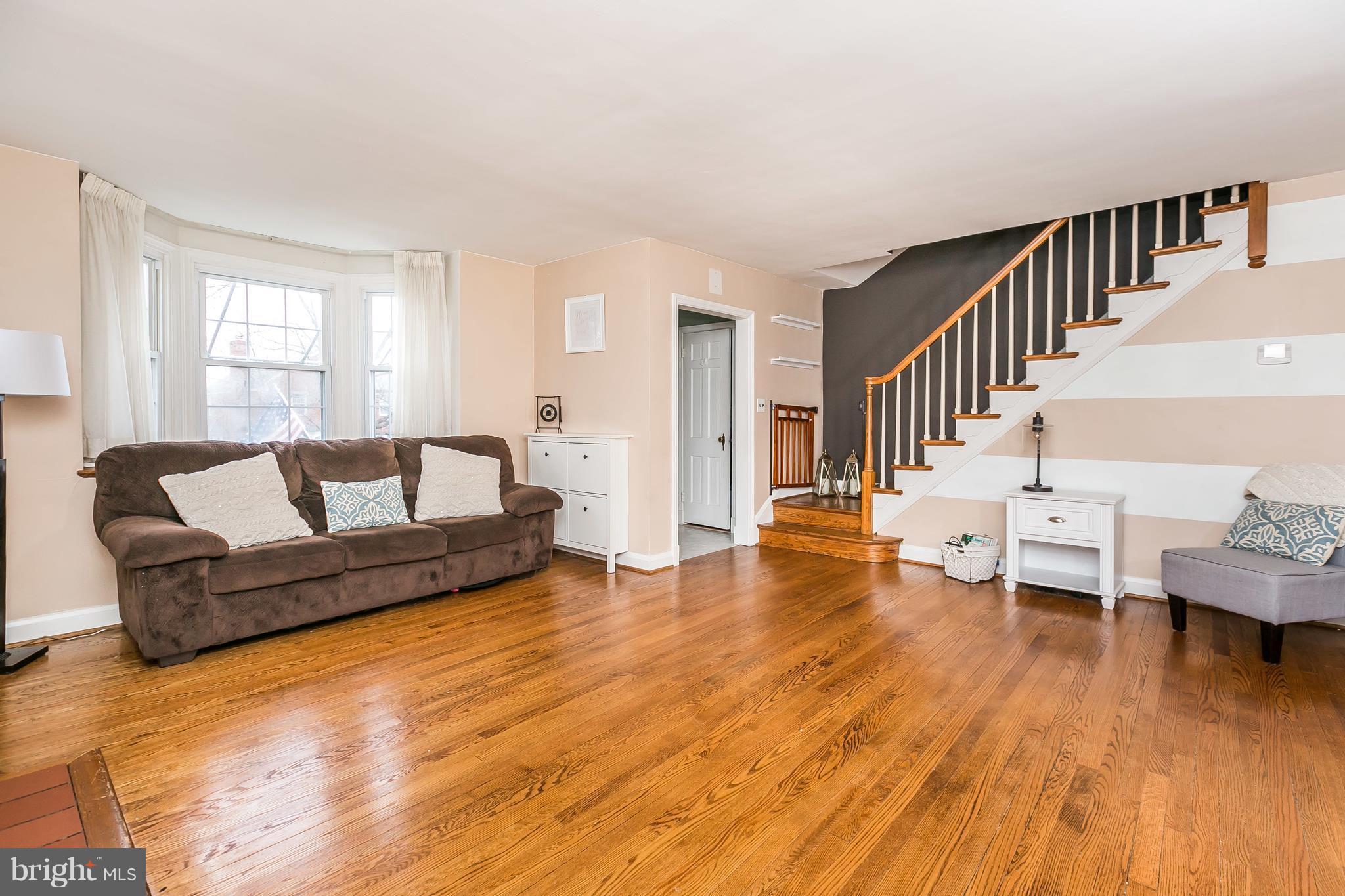 362 Greenlow Road Baltimore, MD 21228 - Photo 5 of 30 a living room with furniture and a wooden floor
