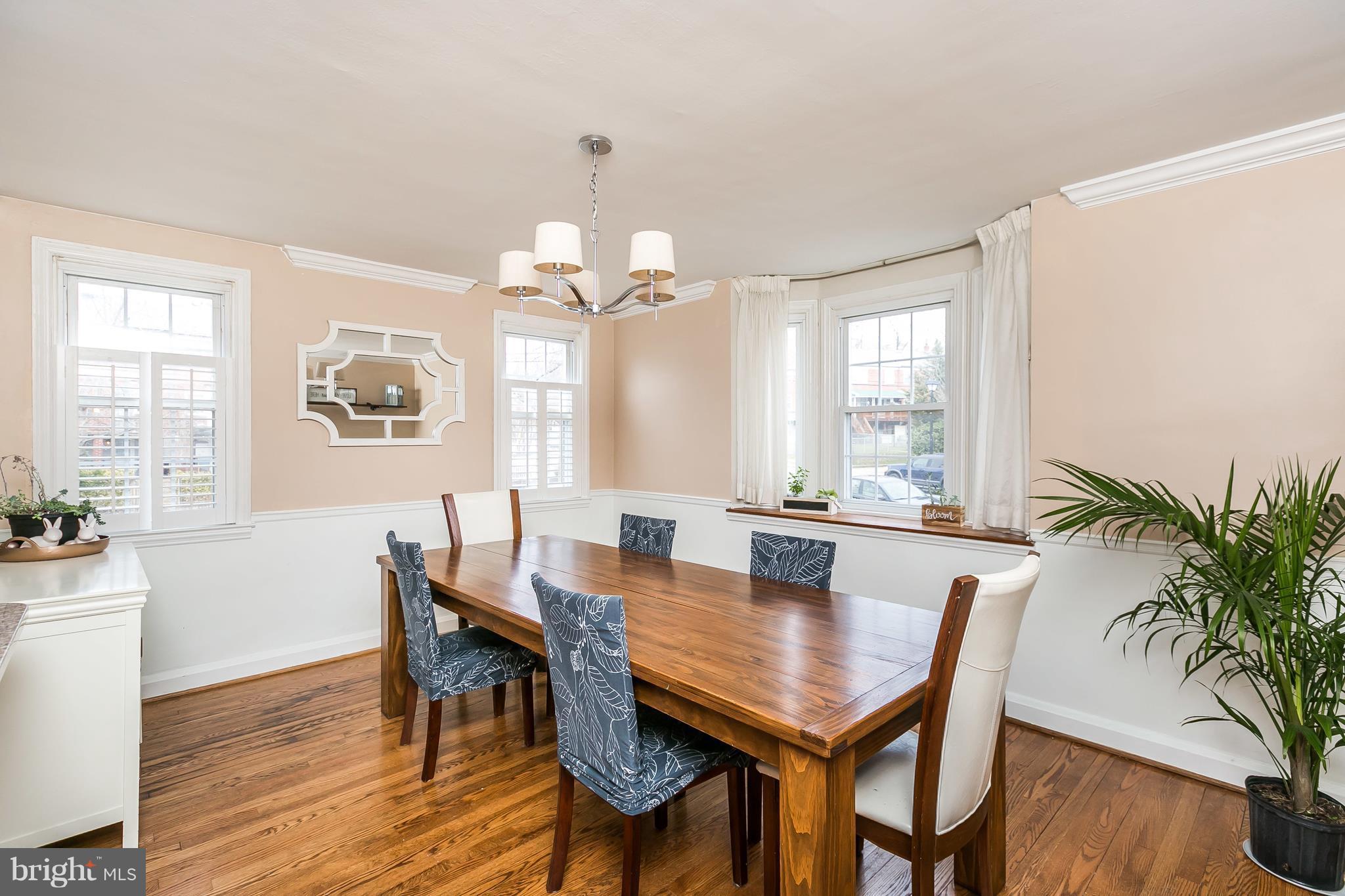 362 Greenlow Road Baltimore, MD 21228 - Photo 7 of 30 a view of a dining room with furniture window and wooden floor