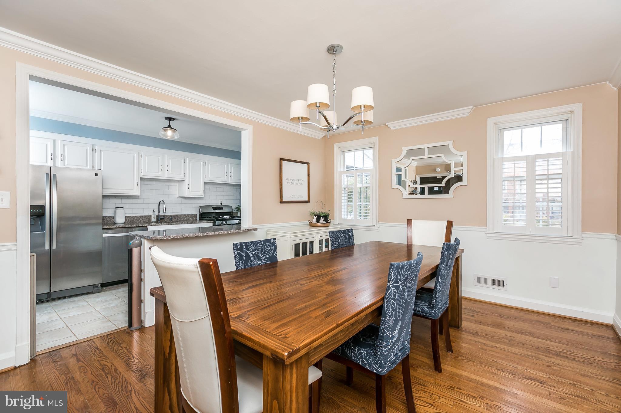 362 Greenlow Road Baltimore, MD 21228 - Photo 30 of 30 a view of a dining room with furniture window and wooden floor
