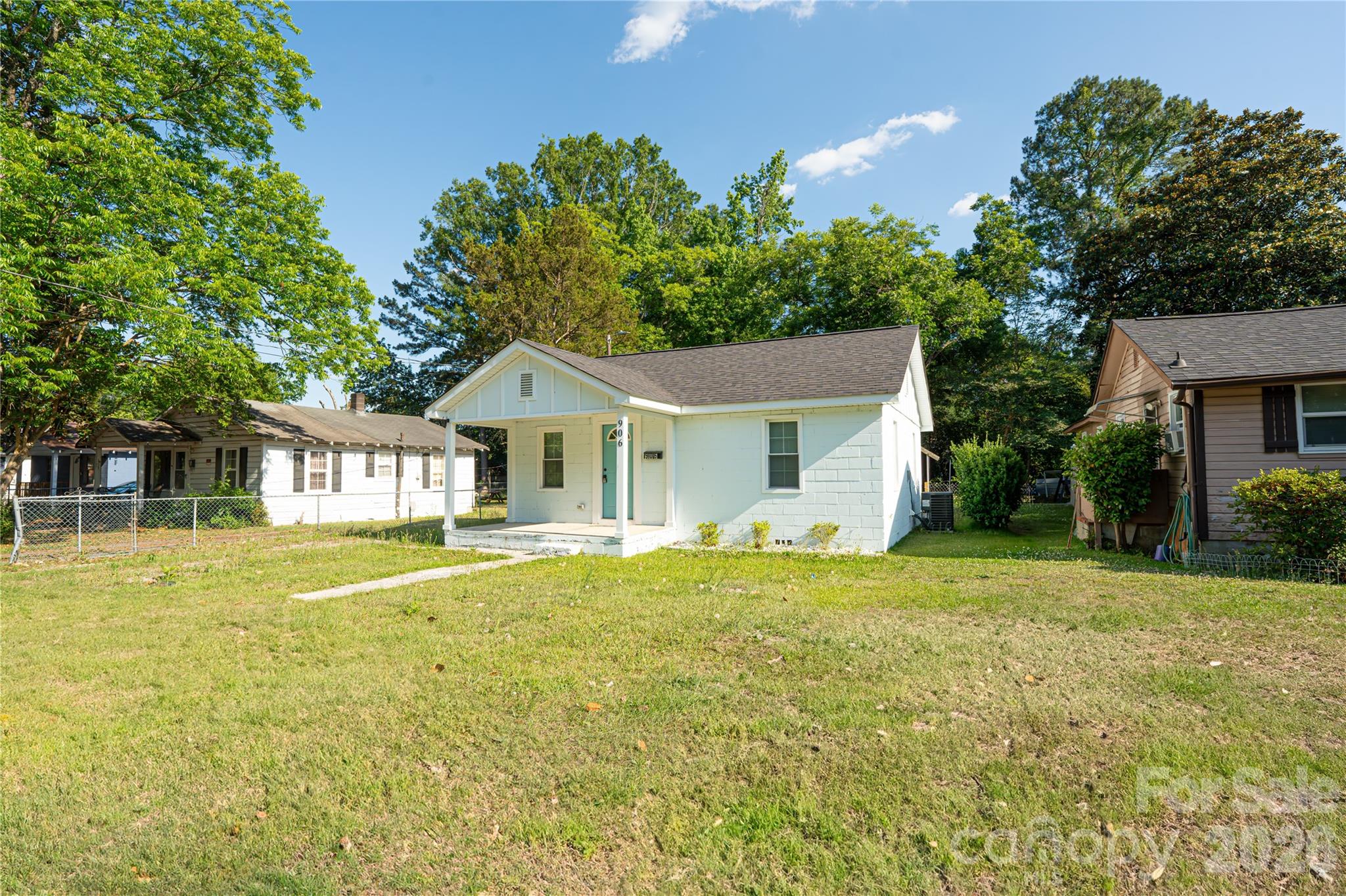 906 Gladstone Street Florence, SC 29501 - Photo 3 of 15 a front view of a house with a garden