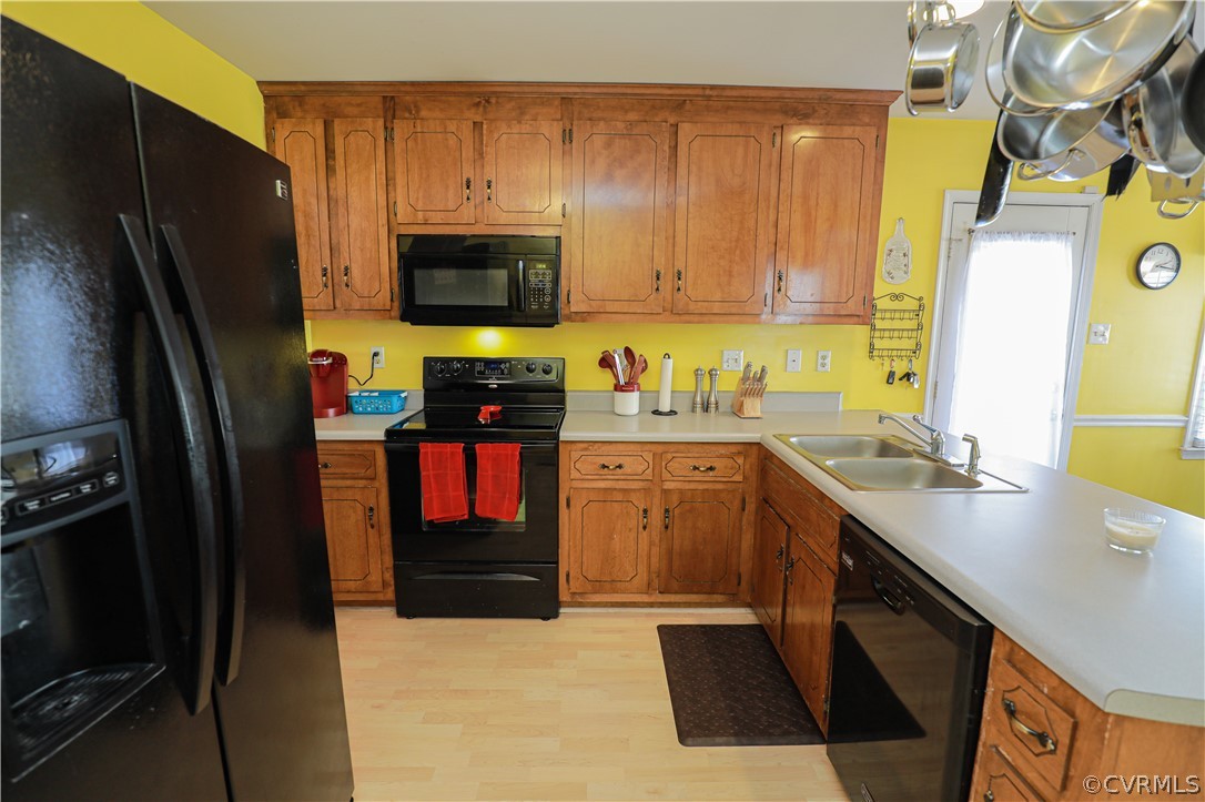 13824 Village Ridge Drive Midlothian, VA 23114 - Photo 15 of 43 a kitchen with stainless steel appliances granite countertop a refrigerator a stove top oven a sink and dishwasher