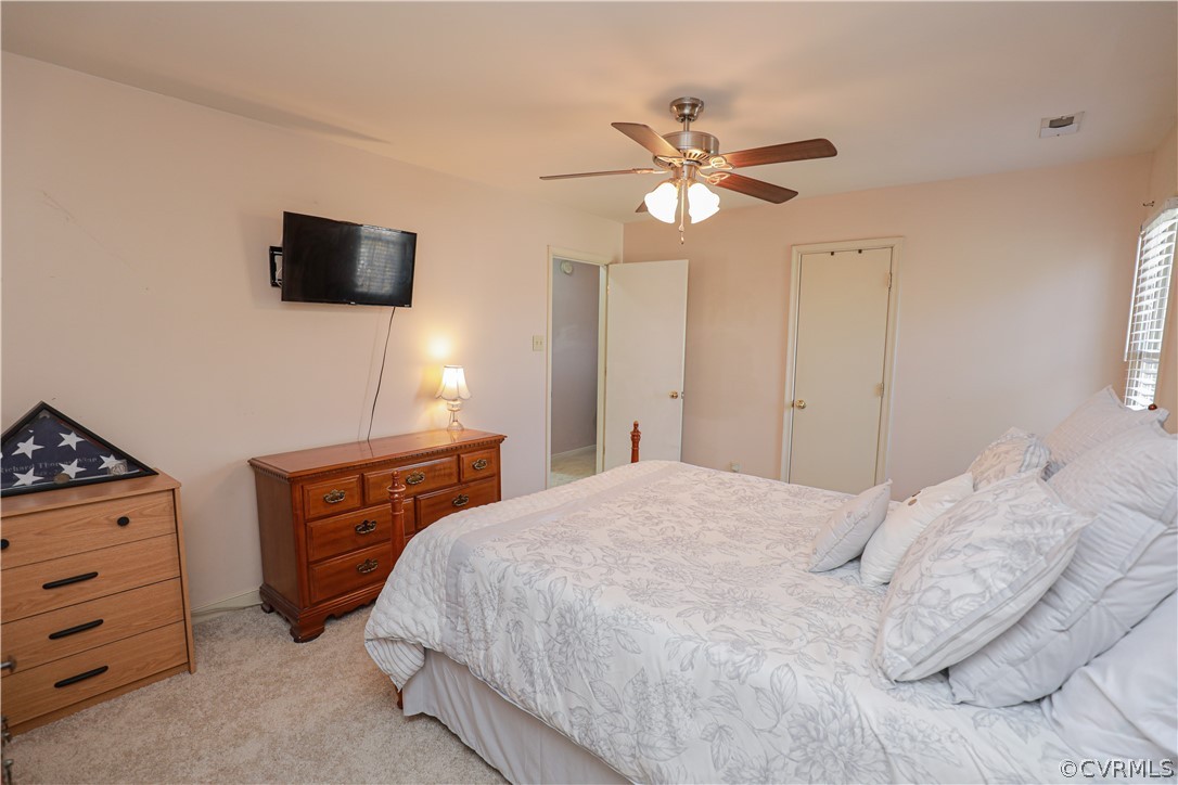 13824 Village Ridge Drive Midlothian, VA 23114 - Photo 24 of 43 a bedroom with a bed and a television