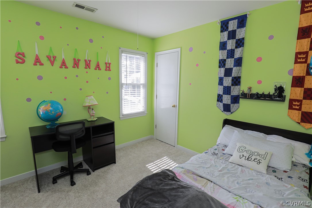 13824 Village Ridge Drive Midlothian, VA 23114 - Photo 28 of 43 a bedroom with a bed and a window