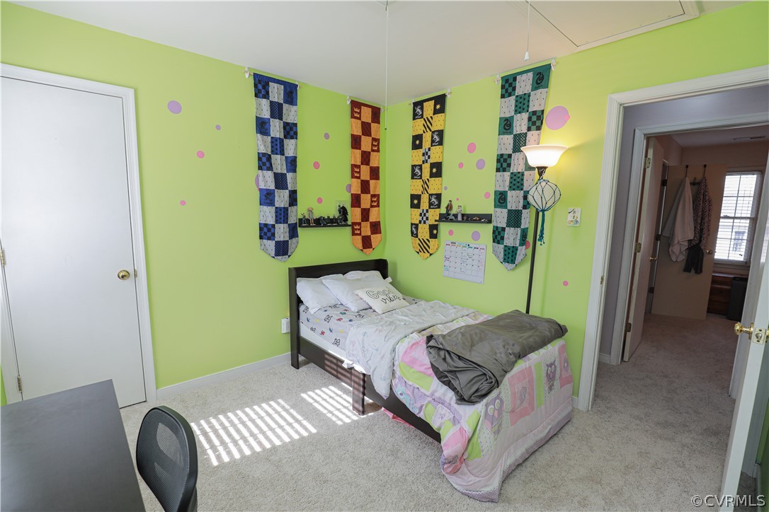 13824 Village Ridge Drive Midlothian, VA 23114 - Photo 30 of 43 a bedroom with a bed and a wall painting