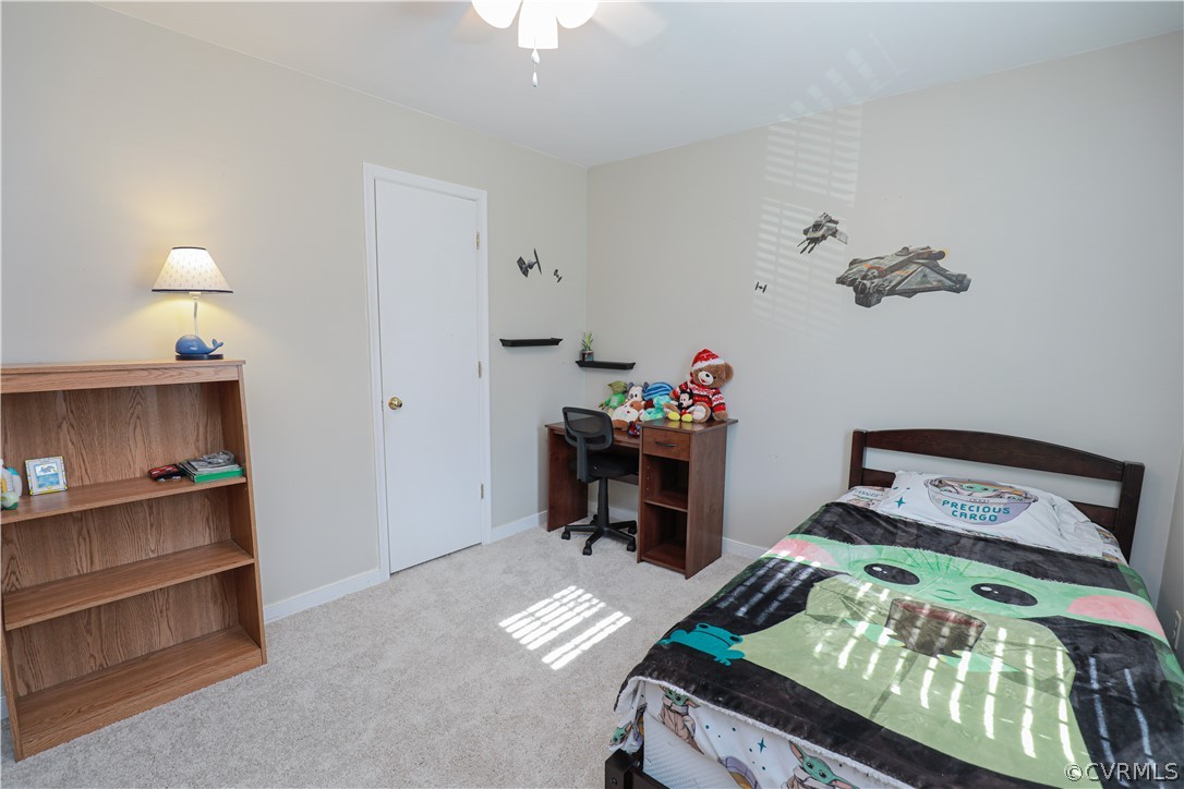 13824 Village Ridge Drive Midlothian, VA 23114 - Photo 32 of 43 a bedroom with a bed and a window