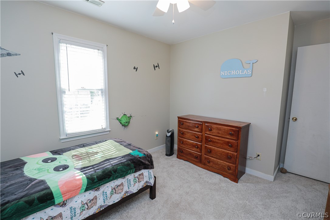 13824 Village Ridge Drive Midlothian, VA 23114 - Photo 33 of 43 a bedroom with a bed and a dresser