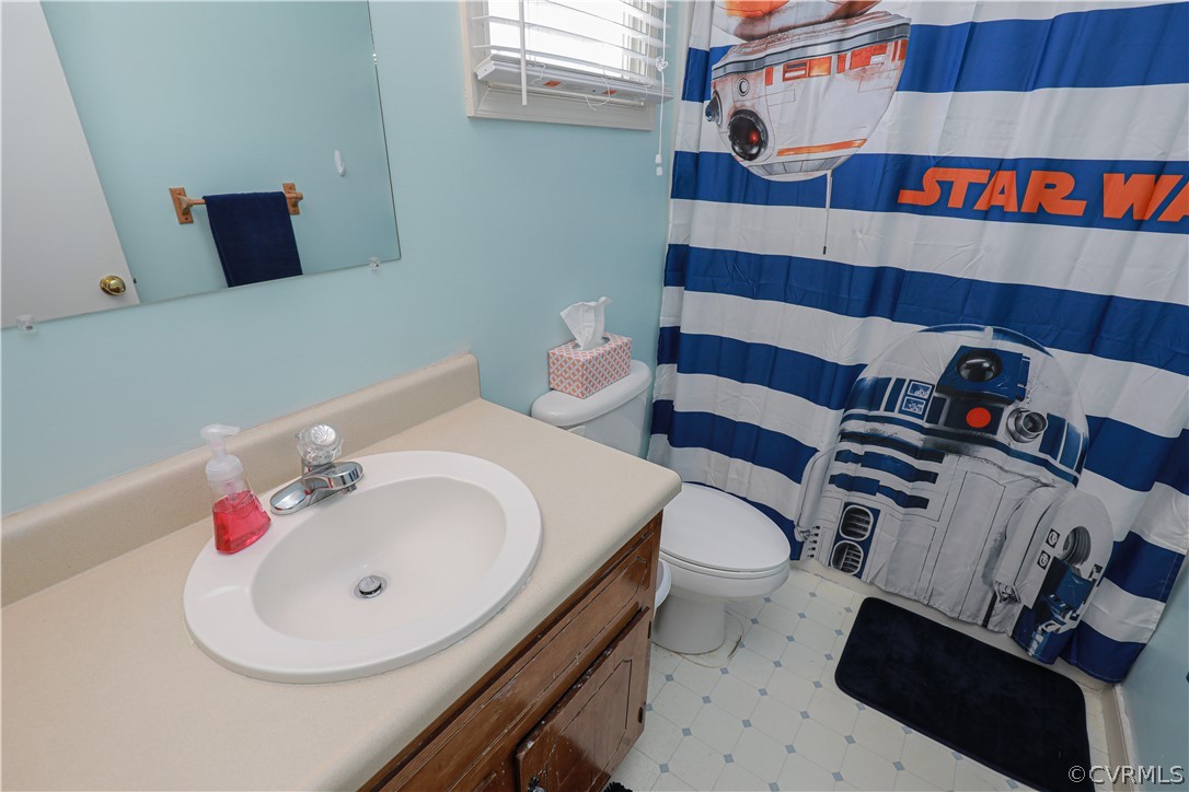 13824 Village Ridge Drive Midlothian, VA 23114 - Photo 34 of 43 a bathroom with a sink and a toilet