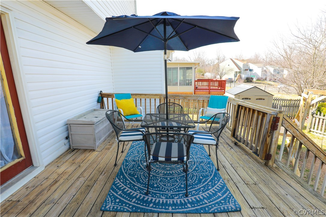 13824 Village Ridge Drive Midlothian, VA 23114 - Photo 37 of 43 an outdoor sitting area with furniture and wooden floor