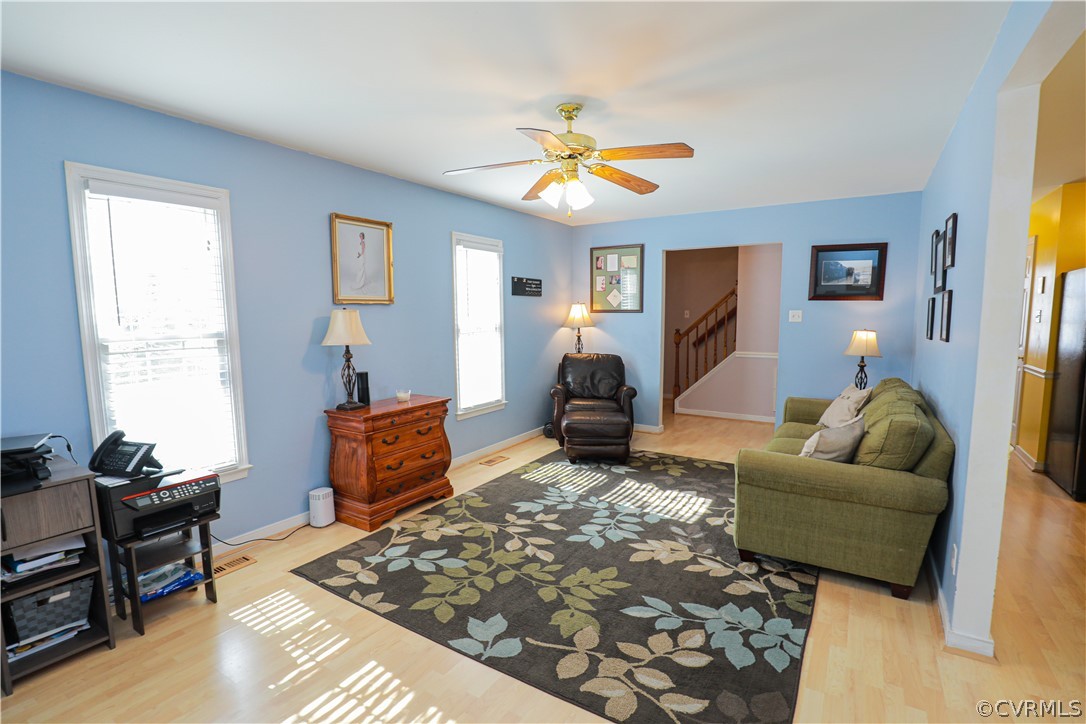 13824 Village Ridge Drive Midlothian, VA 23114 - Photo 6 of 43 a living room with furniture and a flat screen tv