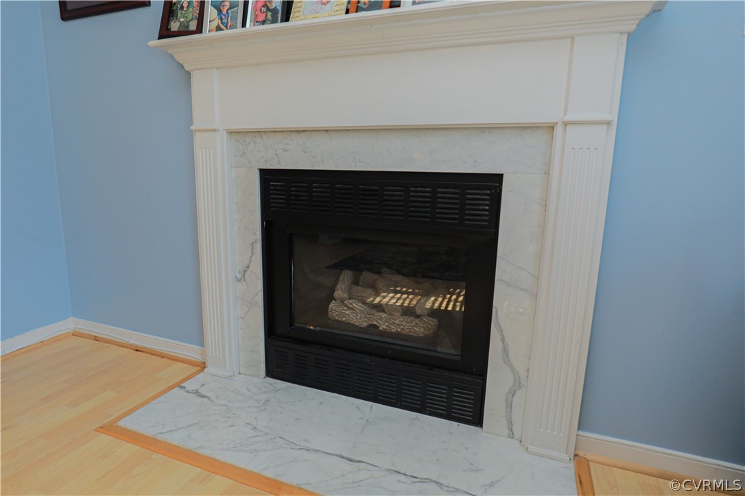 13824 Village Ridge Drive Midlothian, VA 23114 - Photo 8 of 43 a living room with a fireplace