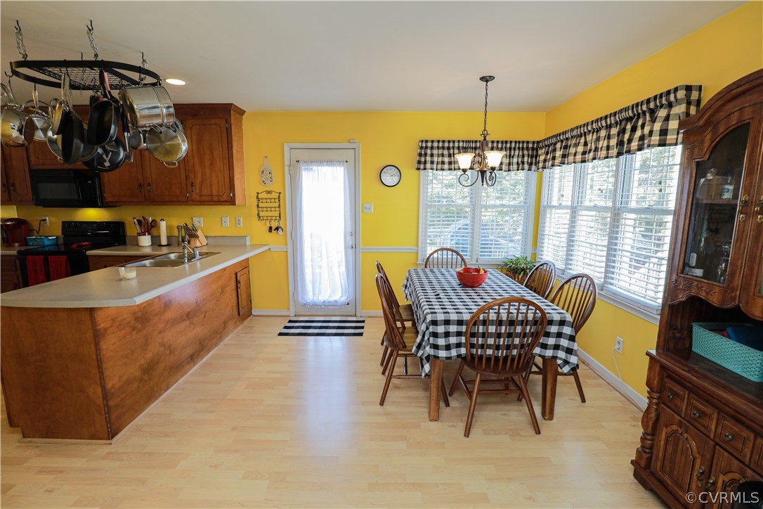 13824 Village Ridge Drive Midlothian, VA 23114 - Photo 9 of 43 a dining room with furniture and window