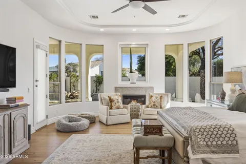 a bedroom with a bed and a couch