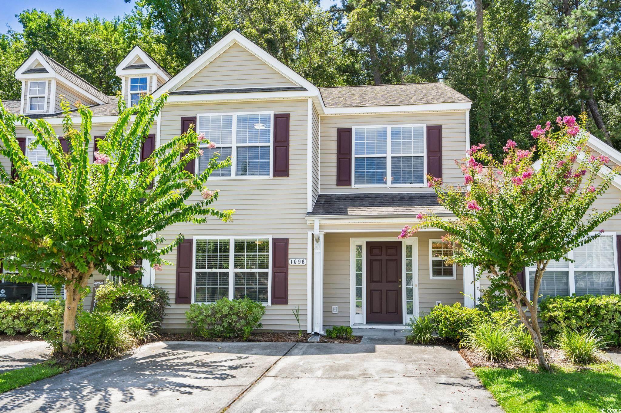 1096 Harvester Circle Myrtle Beach, SC 29579 - Photo 1 of 39 Traditional-style home with a shingled roof