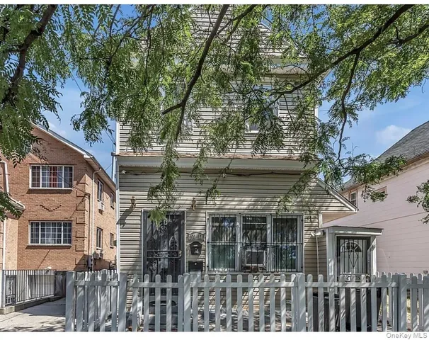 front view of house with a tree