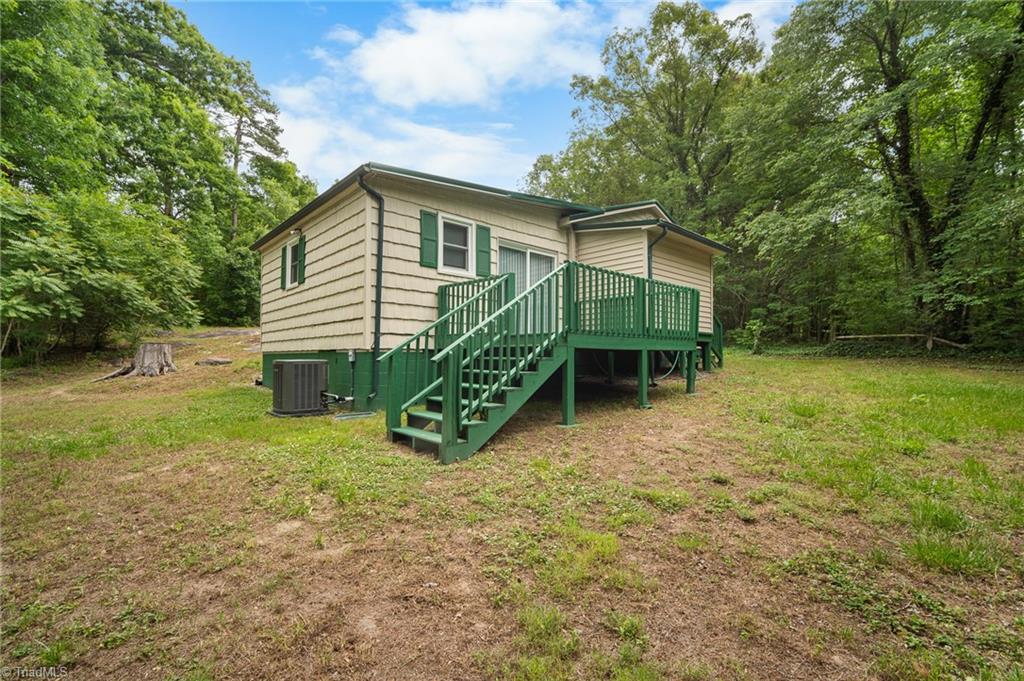 531 Frye Bridge Road Clemmons, NC 27012 - Photo 21 of 29 Enjoy your morning coffee and relax in nature on the back deck