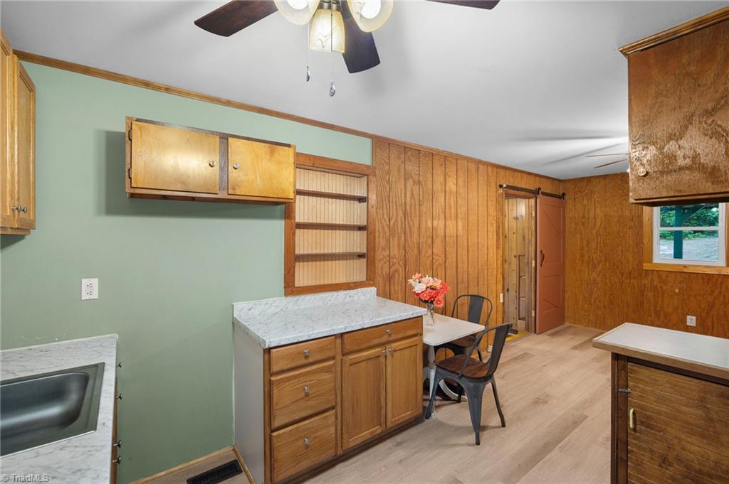 531 Frye Bridge Road Clemmons, NC 27012 - Photo 28 of 29 Open floor plan for the living room, dining space and kitchen and laundry space. All appliances stay with the home.