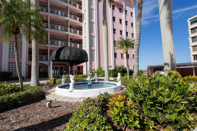 a view of a building with potted plants