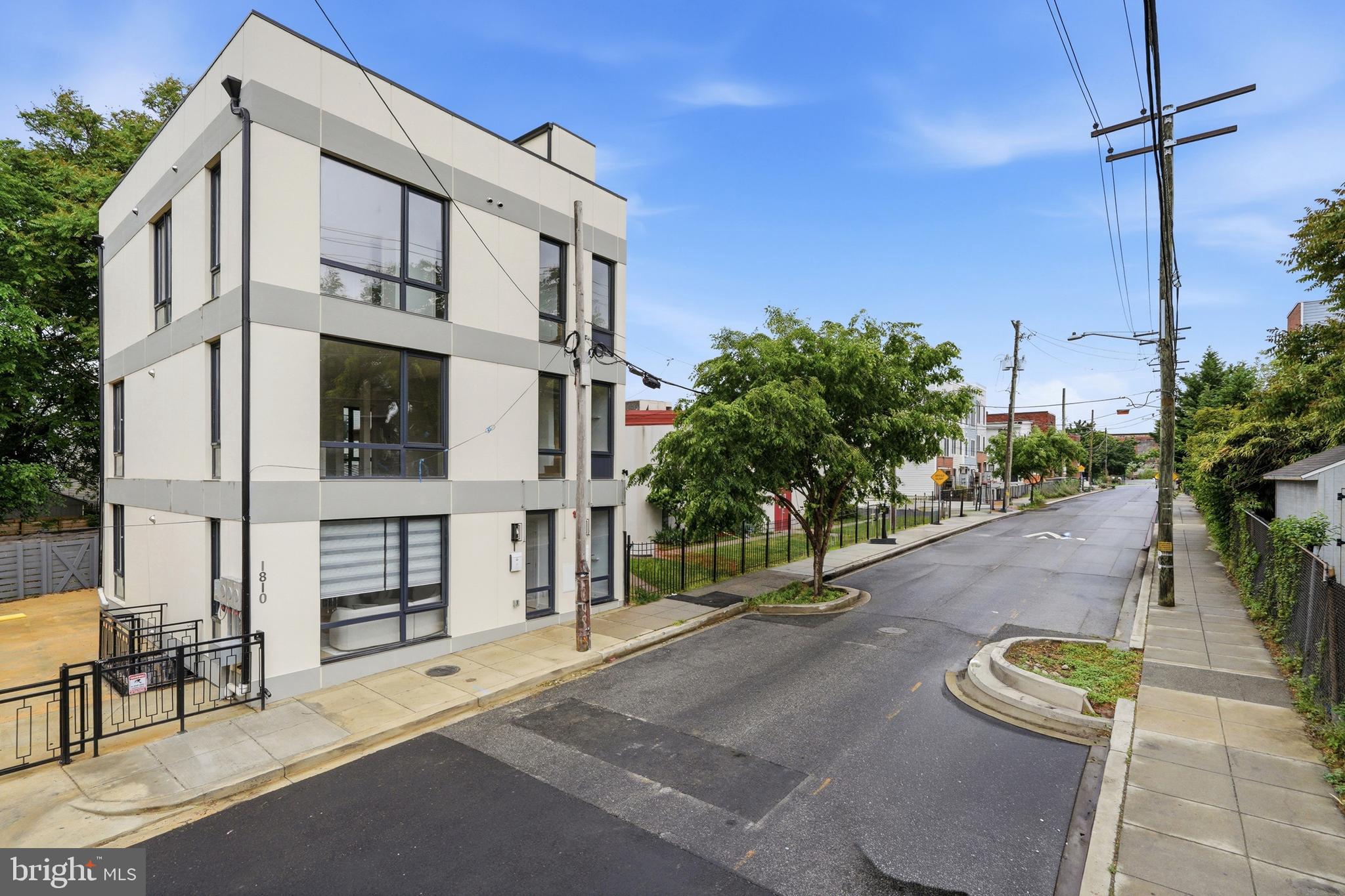 1810 Central Place Northeast, Unit 1 Washington, DC 20002 - Photo 3 of 36 a view of a building with a street